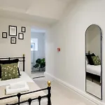 Opulent 2-Bed Retreat With Garden